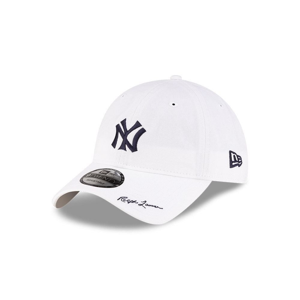 Front left view of New Era x Ralph Lauren Yankees 9TWENTY White Cap highlighting the Ralph Lauren script on visor