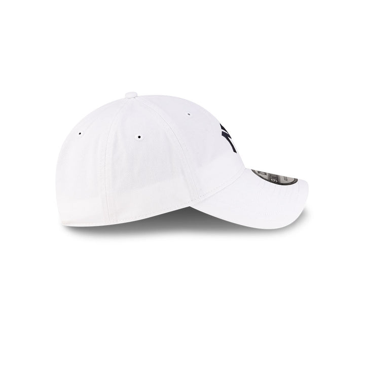 Right side profile view of New Era x Ralph Lauren Yankees 9TWENTY White Cap showing pre-curved visor.