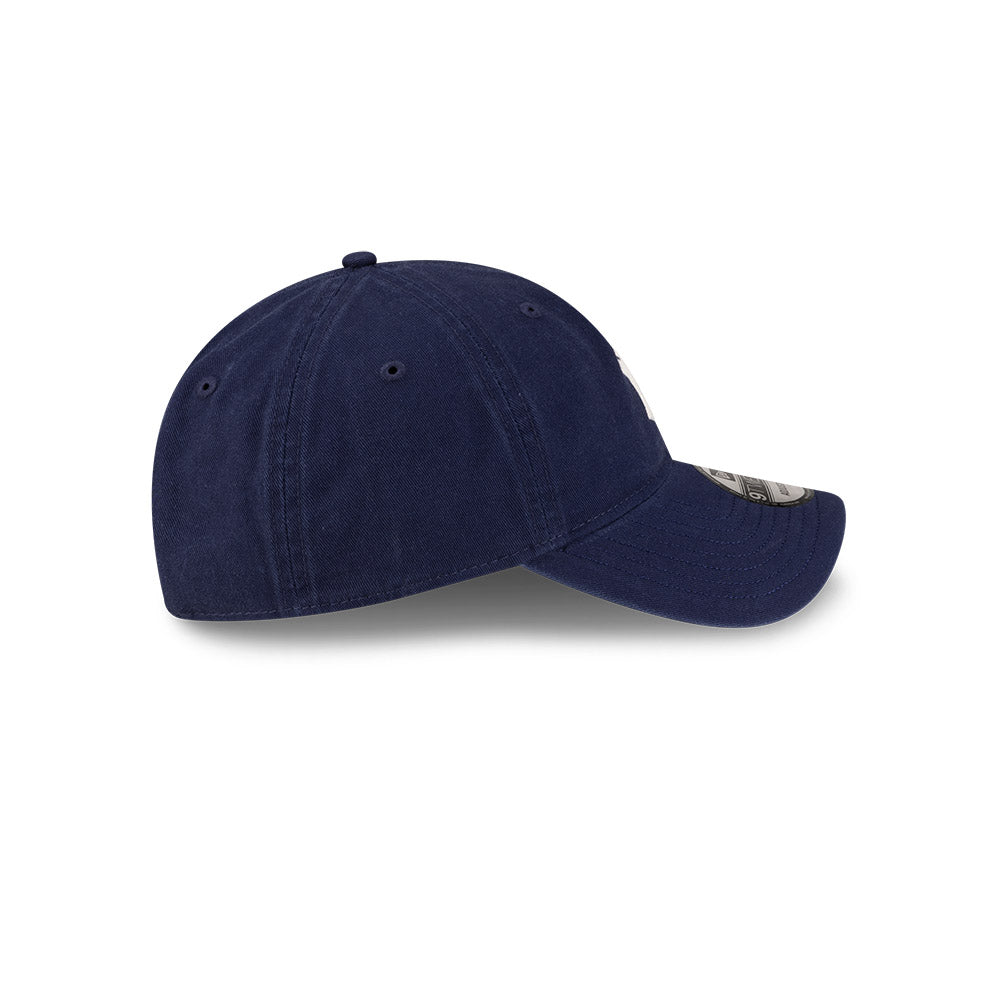 Right side profile view of New Era x Ralph Lauren Yankees 9TWENTY Navy Cap showing pre-curved visor.