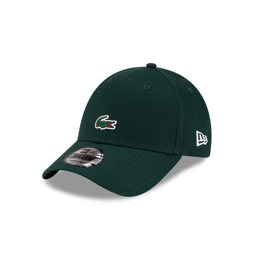 Front left view of New Era x Lacoste 9FORTY Core Dark Green Adjustable Cap highlighting the classic New Era flag logo