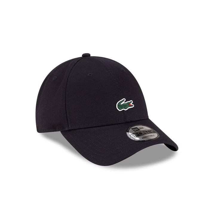 Front right view of New Era x Lacoste 9FORTY Core Navy Adjustable Cap displaying the classic crown.