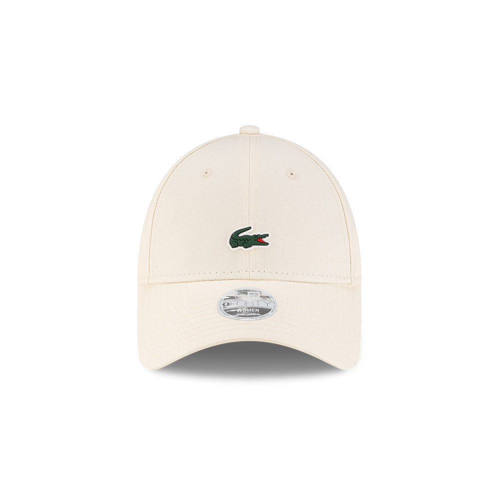 Front view of New Era x Lacoste 9FORTY Women Core Light Beige Adjustable Cap highlighting the centered crocodile logo