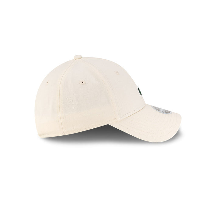 Right side profile view of New Era x Lacoste 9FORTY Women Core Light Beige Adjustable Cap showing pre-curved visor.