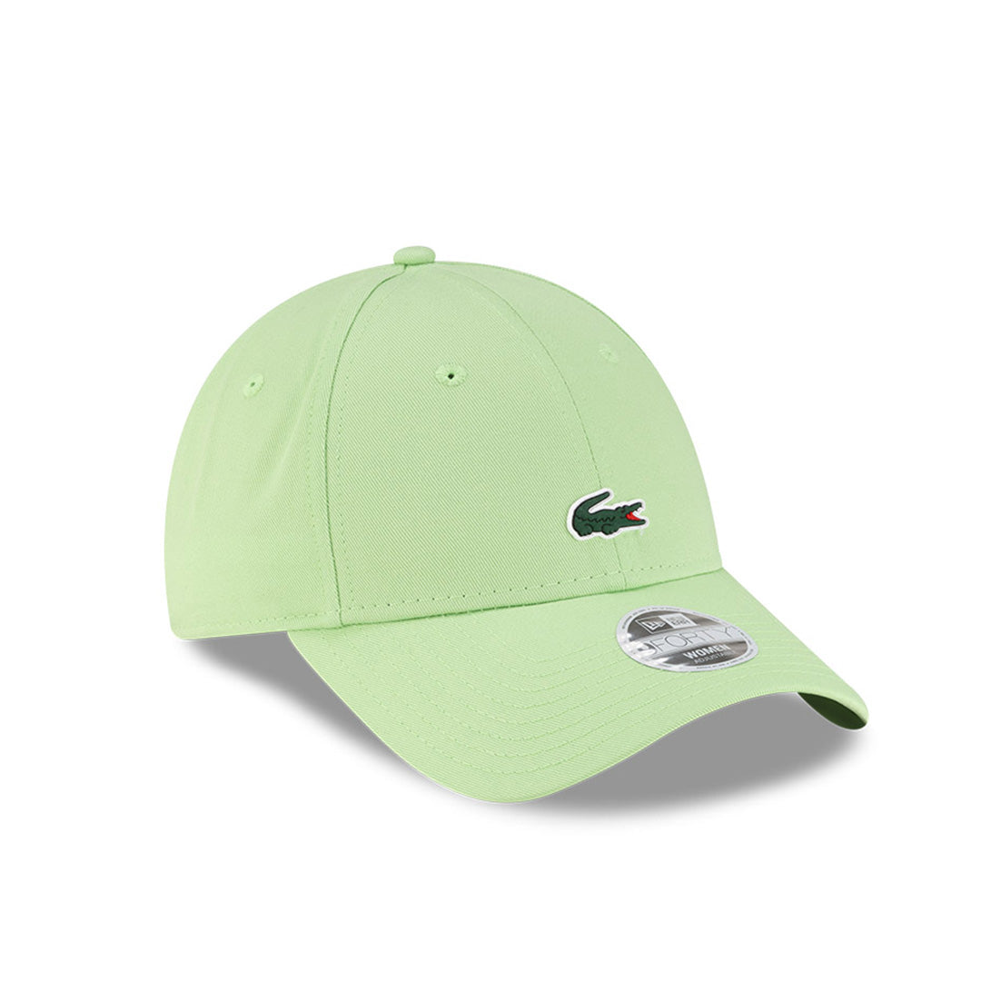 Front right view of New Era x Lacoste 9FORTY Women Core Pastel Green Adjustable Cap displaying the classic crown.