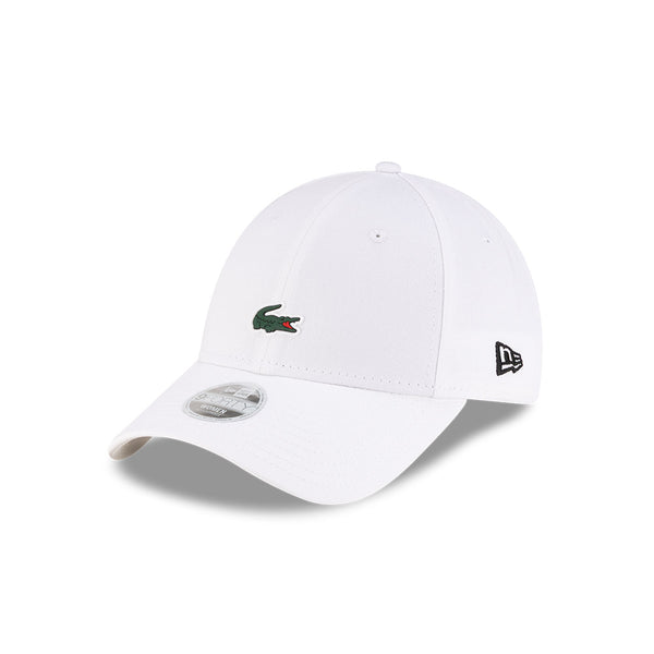 Front left view of New Era x Lacoste 9FORTY Women Core White Adjustable Cap highlighting the classic New Era flag logo