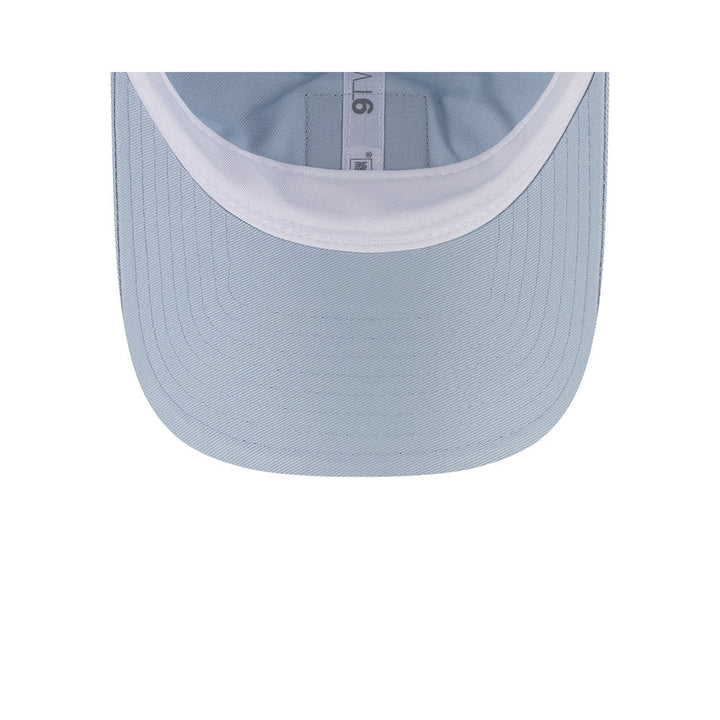 Undervisor view of New Era x Lacoste 9TWENTY Golf Ball Pastel Blue Adjustable Cap showing the clean under-brim detail.
