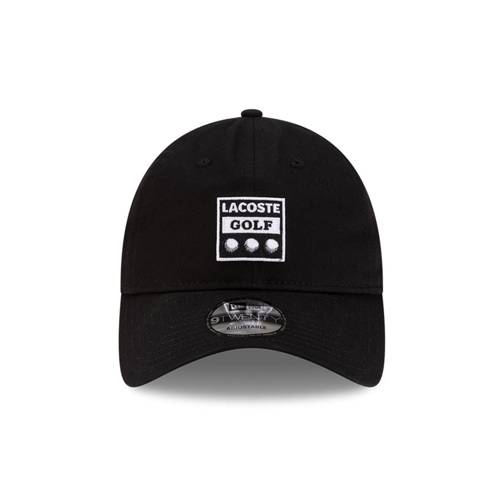 Front view of New Era x Lacoste 9TWENTY Golf Ball Black Adjustable Cap highlighting the rectangular Lacoste Golf patch